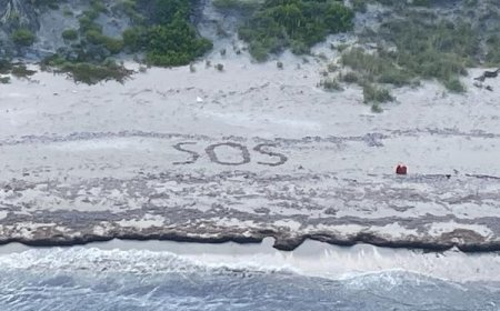 Un sos scritto sulla sabbia salva un naufrago